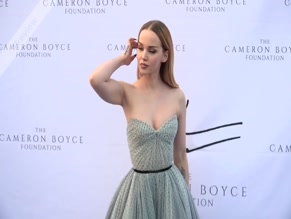 Dove Cameron strapless dress cleavage
