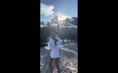 Kimberly Garner fully clothed beach