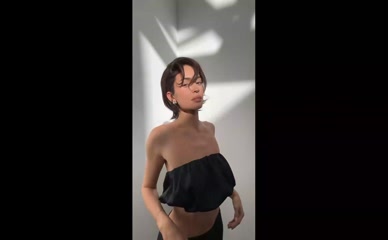 Kylie Jenner topless in shadow play