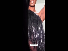 Normani: Sheer outfits expose nipples, deep cleavage, whip use