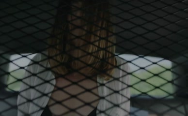 Emma Lahana topless in cop car.