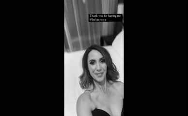 Alex Jones bare shoulders on bed