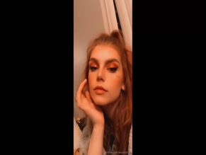 sexyredinbed laughing