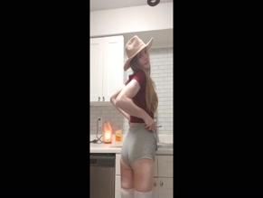 astra763: Posing in form-fitting shorts and crop top