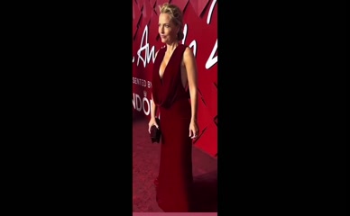 Gillian Anderson deep cleavage red dress