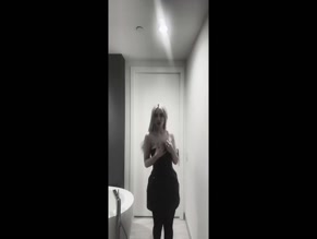 Ava Max topless bathroom dance.