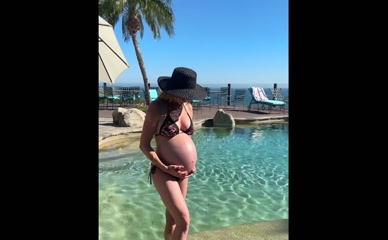 Caity Lotz Pregnant Bikini Poolside