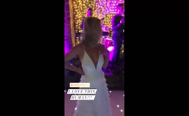 Jorgie Porter dancing in white dress.