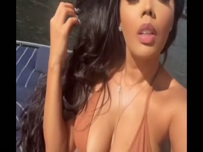 Angela Simmons bikini cleavage
