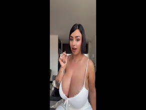 Amaretto Hammer big tits tease