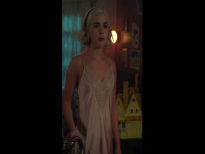 Kiernan Shipka exposed midriff, visible bra, bare back and panties