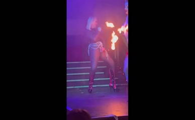 Claire Sweeney topless fire performance