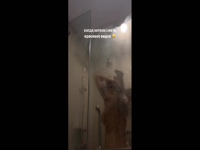 Dance Malyshka exposing breasts in shower
