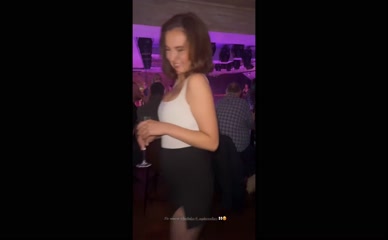 Sophie Wallace dancing in a club.