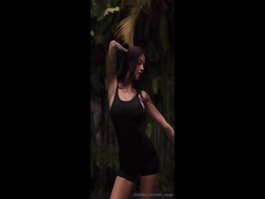 Polly Yangs wet black swimsuit tease