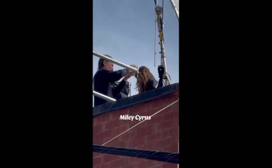 Miley Cyrus Short Skirt Scaffolding.