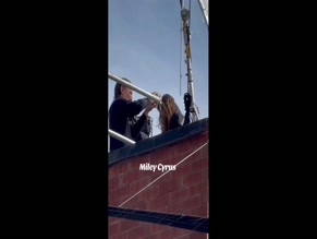 Miley Cyrus Short Skirt Scaffolding.