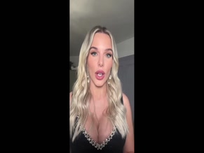Helen Flanagan revealing ample chest in pearl embellished top