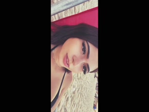 Toricmf bikini top exposing cleavage