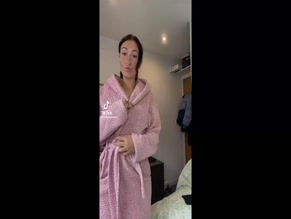 nataliabakerx00:00 Robe removed, exposing body in purple lace bodysuit