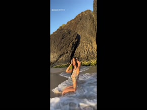 Jessica Green bikini beach pose.