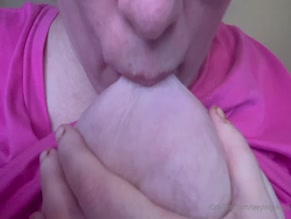sexylexyred69 licking and sucking on large tits