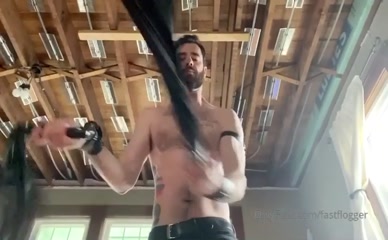 Fastflogger whips his bare chest