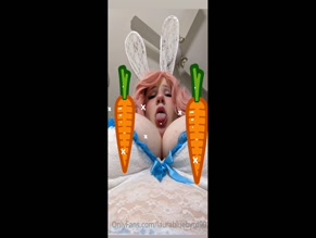 Busty bunny teases with tongue out