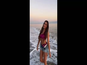Shaela Mc Gilton in bikini and shorts on beach
