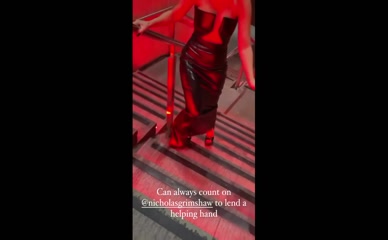 Frankie Bridge struggles in heels, red light.