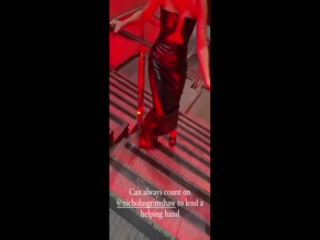 Frankie Bridge struggles in heels, red light.
