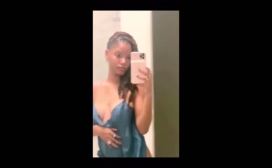 Halle Bailey cleavage slip