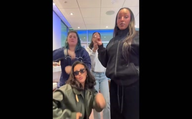 Maya Jama dances in a jacket.