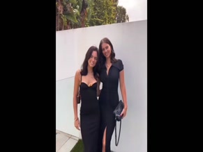 Emilia Dettorre Black Dress Cleavage