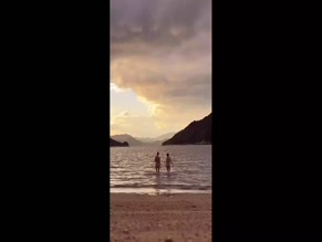 Maisie Williams nude beach swim