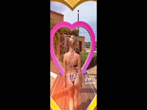 miwallbank: Bikinied posterior exposure.