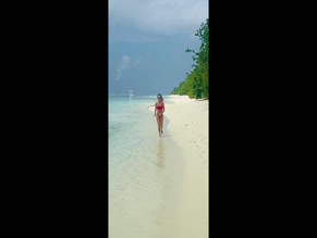 Amanda Holden bikini beach run
