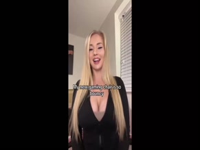 April Mae Displayed Cleavage Black Top.