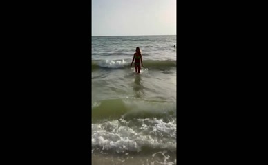 Jacey Birch bikini beach walk.