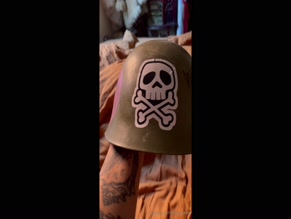 helencorday helmet with WANK GIRL text and vulva graphic
