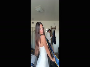 Brooklin Laird hot cleavage showcase in a white dress