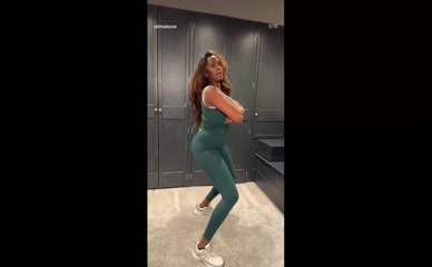 Oti Mabuse dances in green catsuit