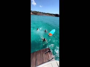 Chloe Ferry boat jump bikini.