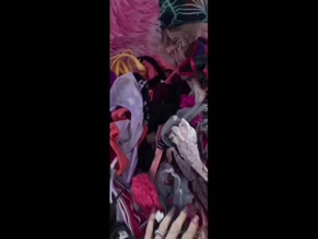 dslkennedi: Hand sifting through large collection of female thongs, panties, and bras.