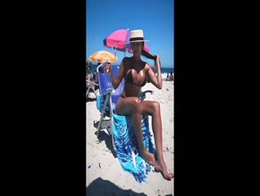 Giovana Roque topless beach pose