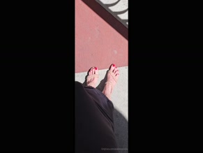 ekaterinalisina: Woman's feet with red toenails and sandals walking outdoors