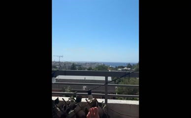 CiCi Coleman bare feet balcony view