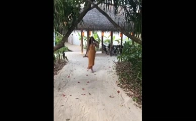 Nicci Jolly bikini to dress transition.