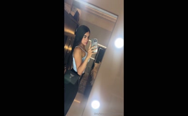loveariarose: Mirror self-portrait in light blue top.