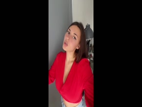 Clarisse Dupont Red Top Cleavage Tease